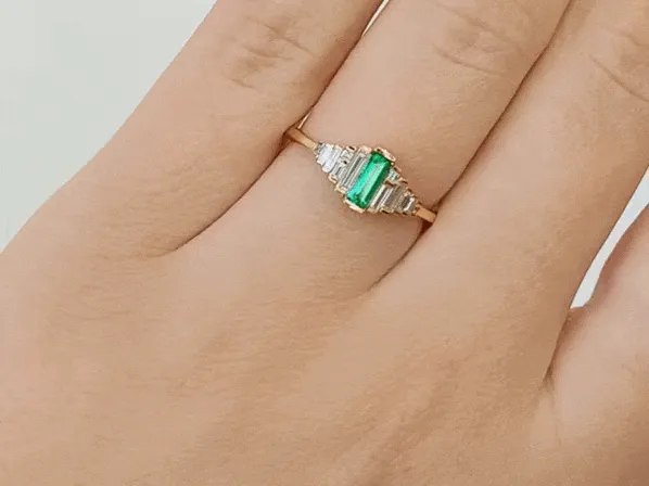 18K Gold and Emerald Ring with Graduated Needle Baguette Diamonds