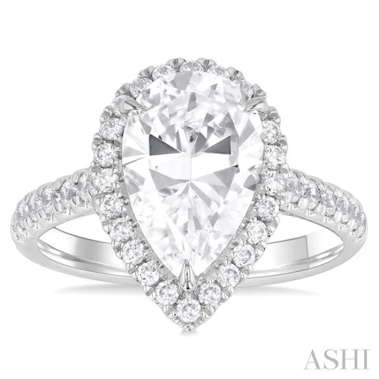 3/4 Ctw Pear Shape Round Cut Diamond Halo Semi Mount Engagement Ring in 14K White Gold