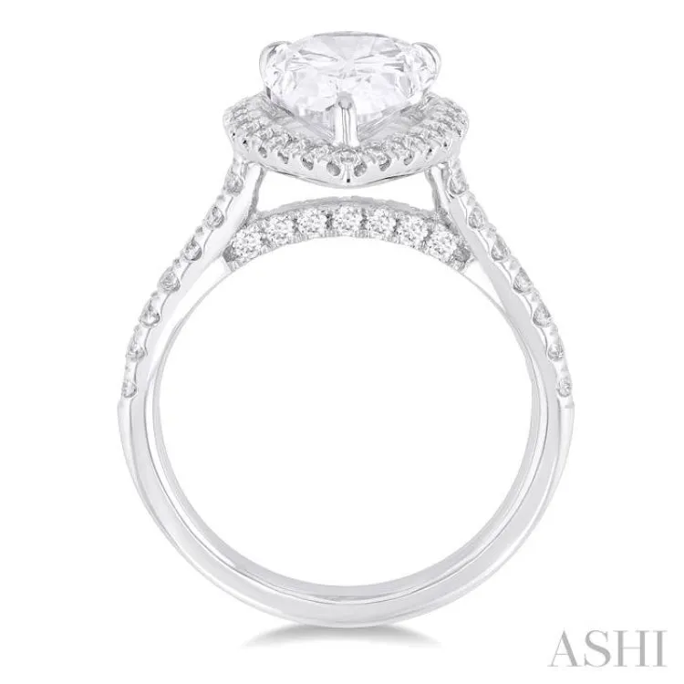 3/4 Ctw Pear Shape Round Cut Diamond Halo Semi Mount Engagement Ring in 14K White Gold