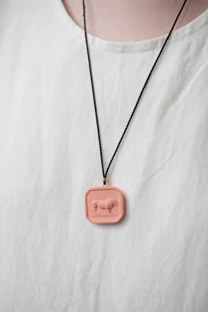 Marcie McGoldrick | Porcelain Cameo Pendant- Leo in Coral