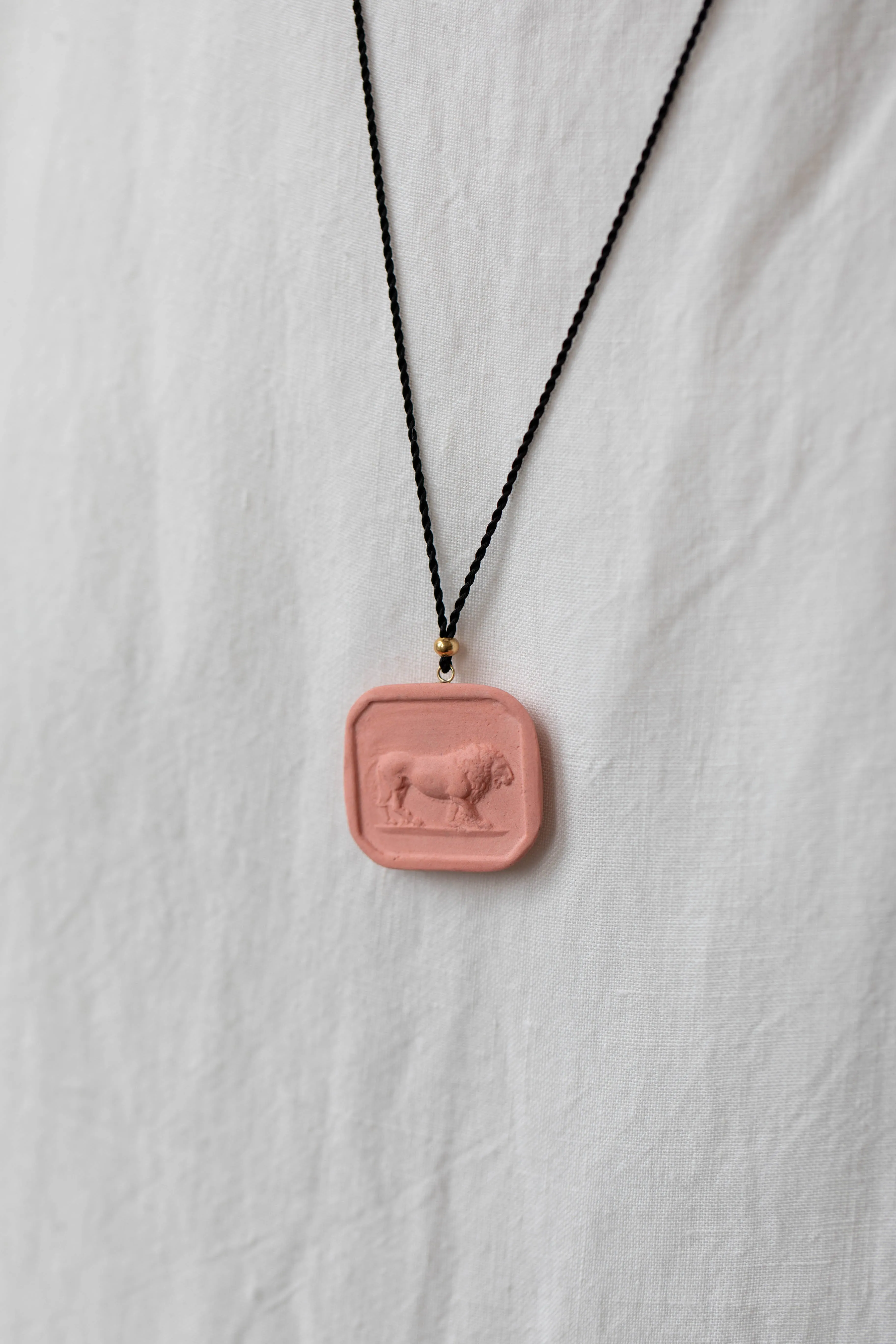 Marcie McGoldrick | Porcelain Cameo Pendant- Leo in Coral