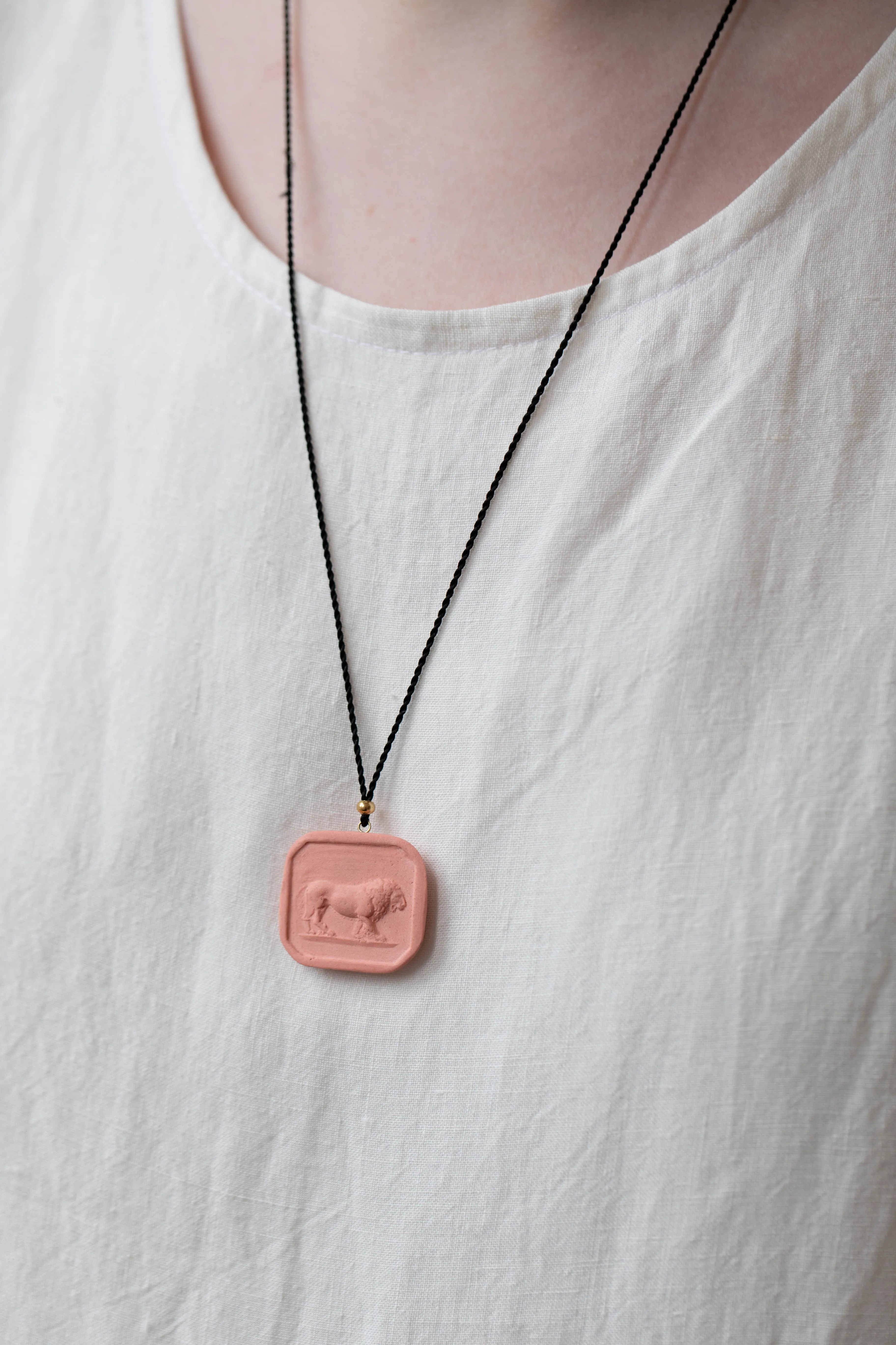 Marcie McGoldrick | Porcelain Cameo Pendant- Leo in Coral