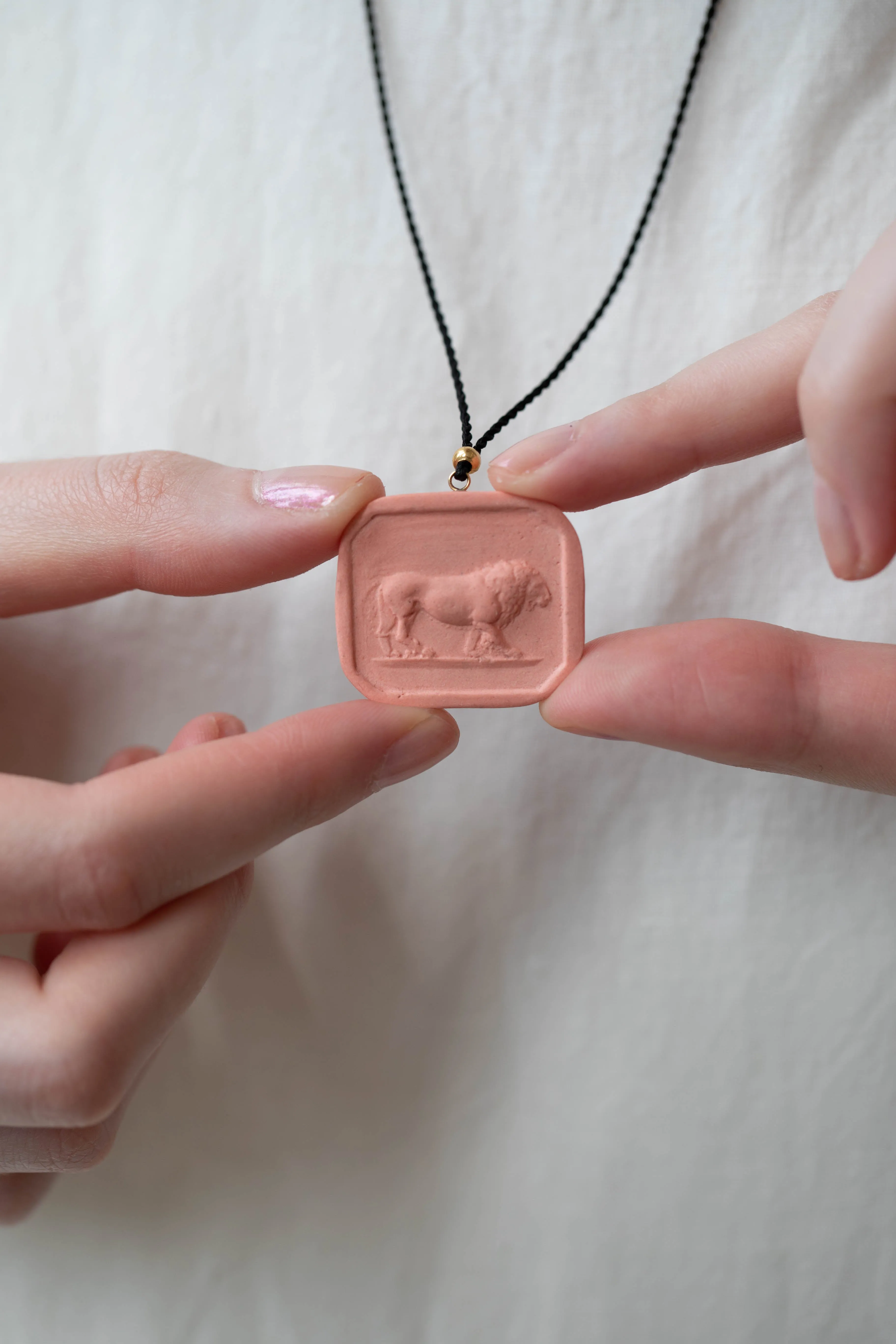 Marcie McGoldrick | Porcelain Cameo Pendant- Leo in Coral