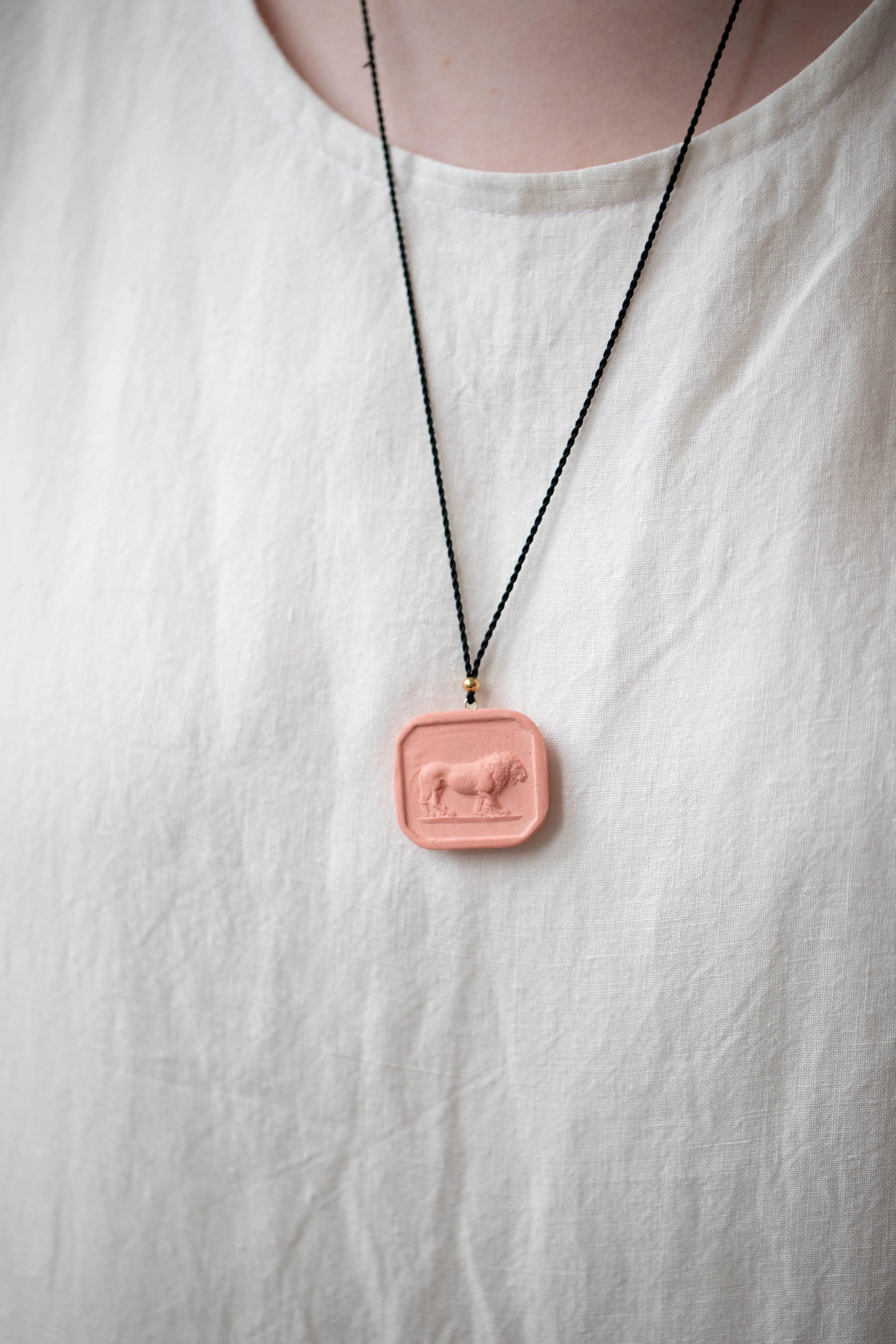 Marcie McGoldrick | Porcelain Cameo Pendant- Leo in Coral