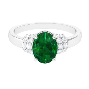 Oval Created Emerald Engagement Ring with Diamond Collar